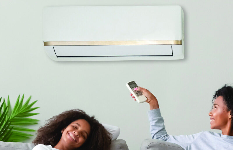 mom using mini split in living room to make it comfortable