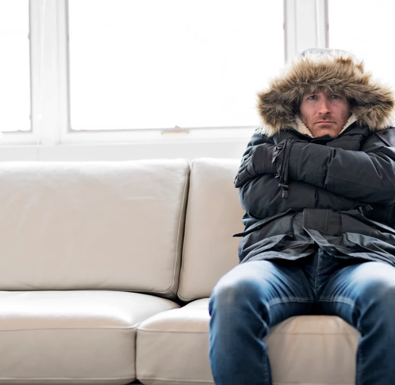 sitting on the couch, freezing indoors, it's time to Revise your HVAC